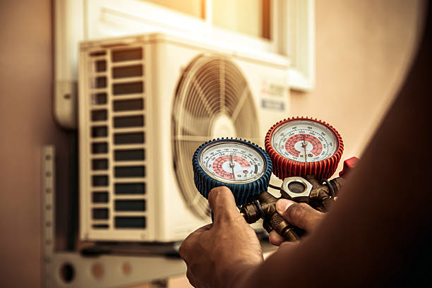 Professional Heat Pump Repair technician working in Crawfordsville, IN